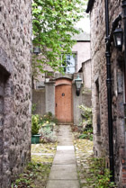 Alley view of a doorway near Kings College in Aberdeen, Scotland