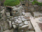 Scara Brae, located on the grounds of the 17th C. Skaill House, Sandwick, was inhabited and thriving in Orkney 5000 years ago. This early settlement of farmers was a tight knitted community of people. Photo by Winfield Swanson