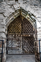 Chepstow Castle, original iron-clad oak gate of the gatehouse constructed in 12thC