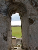 View through the apse window of the Orphir Round Church (or Round Kirk), dedicated to Saint Nicholas. Mentioned in the Orkneyinga Saga in AD 1136.