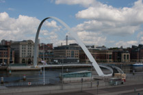 The Gateshead Millennium Bridge 2001, a pedestrian/cycle bridge spans the Tyne River from Gateshead to Newcastle-upon-Tyne, UK.  Designed by architect Wilkinson Eyre