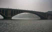 Longmen North Bridge over the Yihe River viewed from Longmen Buddhist Grottoes Luoyang