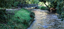 Footbirdge over the River Bollin, Quarry Bank Mill, Styal, Cheshire, England